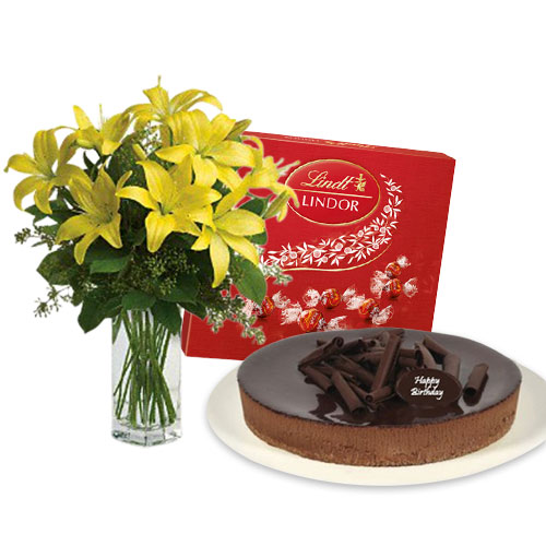 Lilies Bouquet with chocolate cheesecake & Lindt Milk Chocolate Box